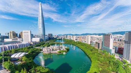 Wallpaper Mural Zoom in Songpa-gu, Jamsil, Seoul, South Korea - July 12, 2025: Aerial view of villas and apartment againsts with Lotte World and Lotte World Tower near Seokchon Lake Torontodigital.ca