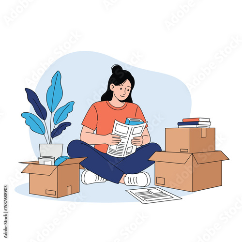 Young woman sitting on the floor reading a newspaper surrounded by moving boxes and houseplants