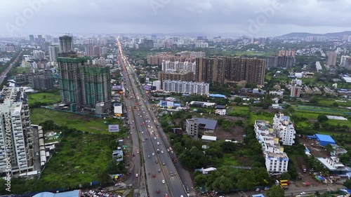 Aerial view Vehicle travel by primary street at downtown hub