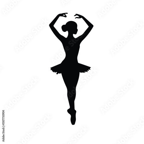 Ballet dancer silhouette in pointe shoes with arms raised in a graceful pose. Female ballet dancer silhouette in a classical tutu, standing in a studio.
