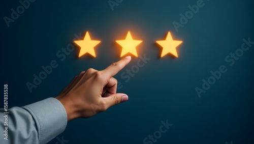 Hand touching glowing yellow stars finger