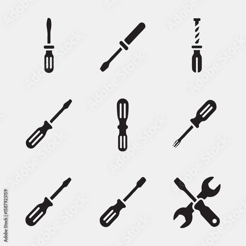 Vector Illustration of Various Screwdrivers and a Wrench
