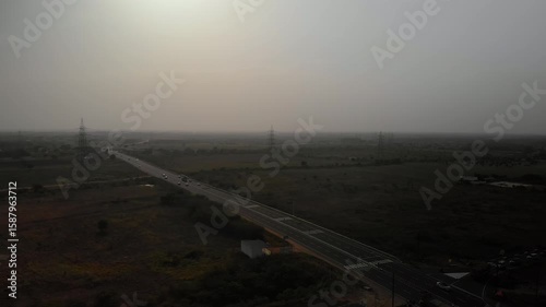 Traffic flow on a highway during a hazy day