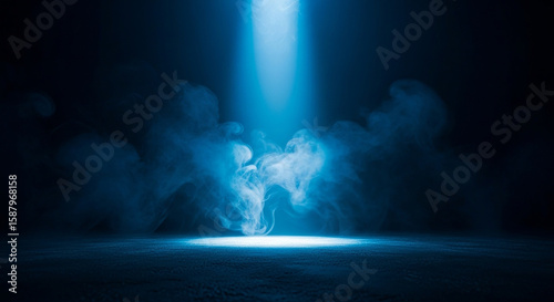 Mysterious blue spotlight illuminates swirling smoke and textured ground in a dark atmospheric scene