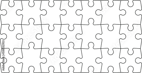 A complete white puzzle with twenty four pieces arranged in a rectangle shape