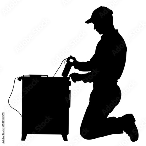 Silhouette of technician testing stovetop burner – Electrical maintenance safety check