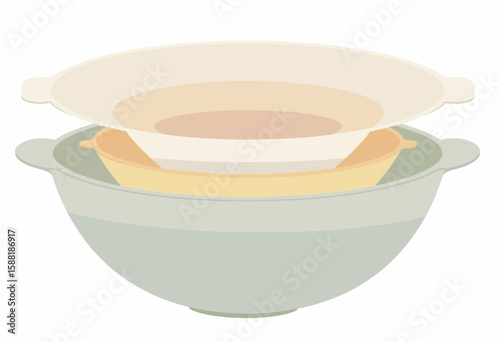 Three nested mixing bowls in soft pastel colors  