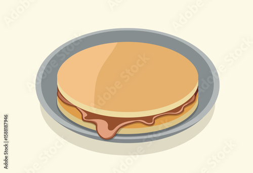 Round sandwich with chocolate filling on plate  