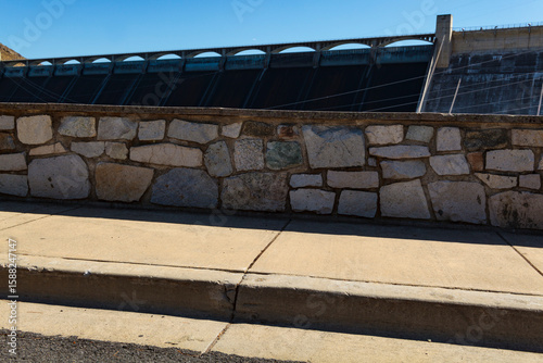 Grand Coulee Dam, view of the solid sloping concrete wall and parapet