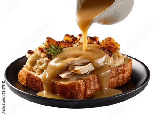Delicious open faced turkey sandwich with stuffing and gravy isolated on transparent background