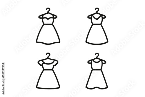 Stylish dress designs displayed on hangers in a modern boutique setting showcasing a variety of fashion options