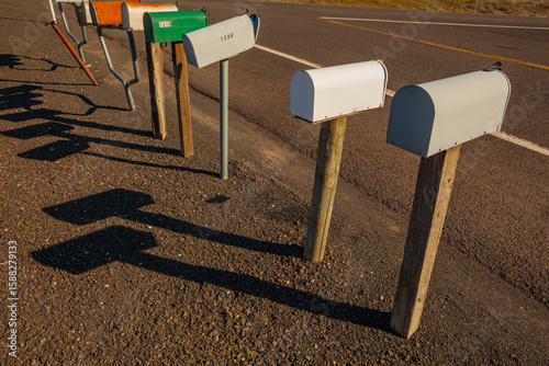 Rural route mail boxes by the side of the road.