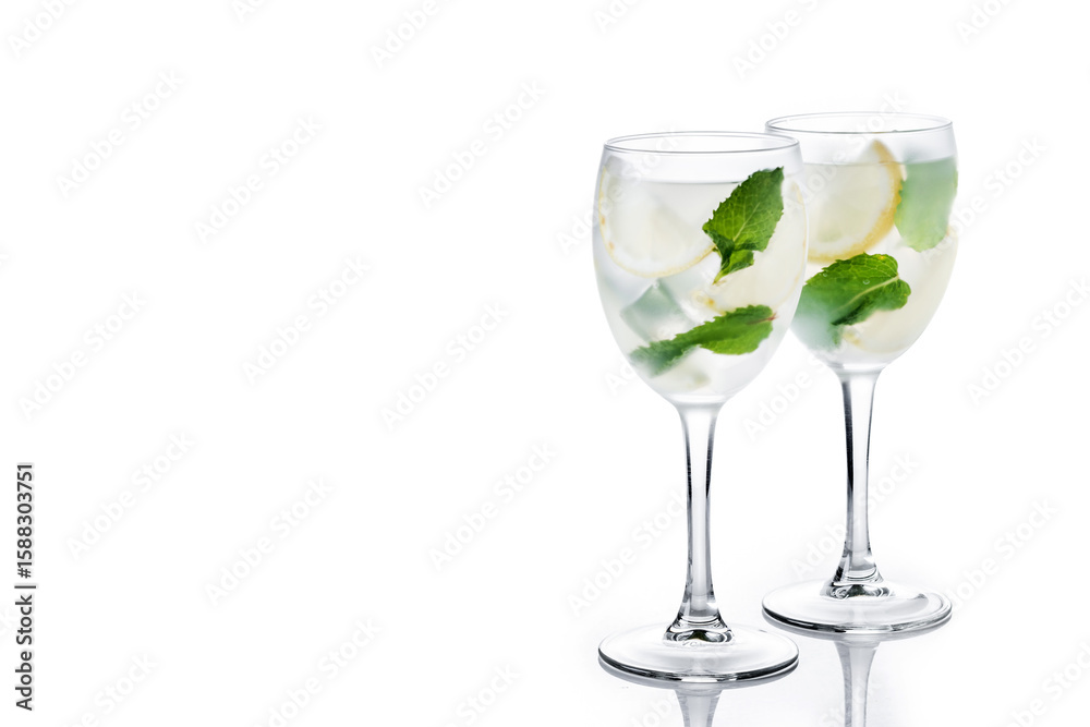 Obraz premium Hugo Spritz cocktail in glass isolated on white background. Copy space