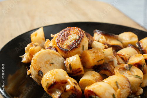 Εκτύπωση καμβά A view of sauteed hearts of palm, on a plate.