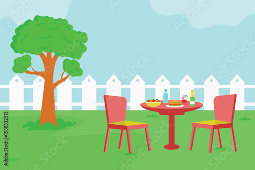 The backyard of the house with shady trees, a set of chairs and a table with food on it.