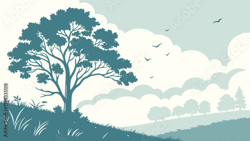 Photo of a solitary tree stands on a grassy hill under a soft, cloudy sky