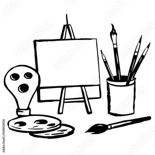 Art supplies arranged on floor with palette, brushes, and canvas  