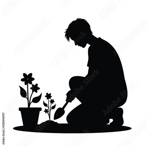 Person planting flowers with shovel silhouette garden