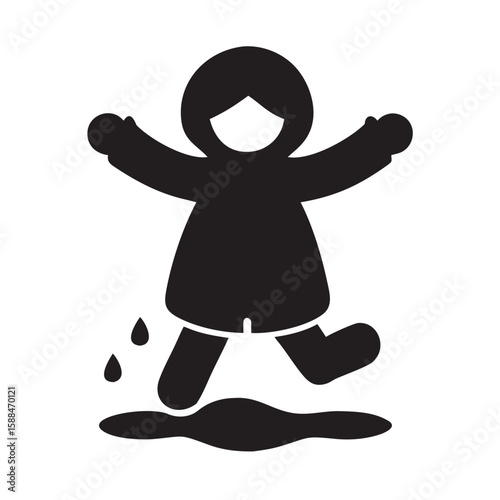 Child jumping in puddles wearing a yellow raincoat