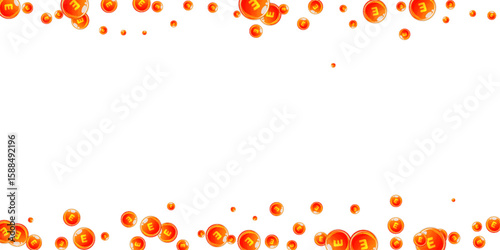 Vitamin E round capsules scattered randomly.
