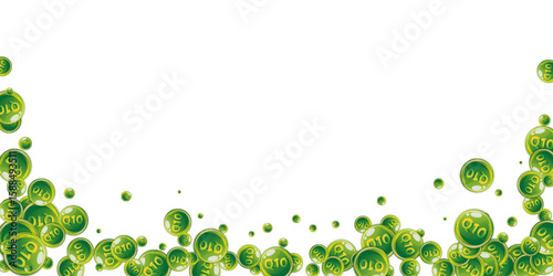 Vitamin Q10 round capsules scattered randomly.