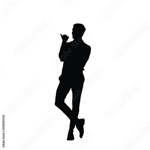 Silhouette of a man standing relaxed while pointing something with his thumbs