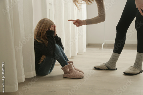 The bullying parent. Angry mother threatening and yelling to child. Harmful parenting method.	