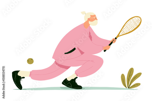 Active senior woman playing tennis in pink sportswear on grass  