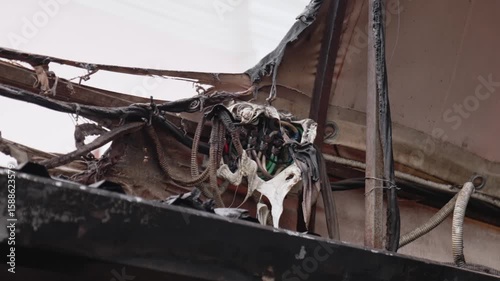 Burnt wiring. Short circuit of the electrics, which resulted in a fire. Failure to comply with safety rules during installation of electrical wiring.