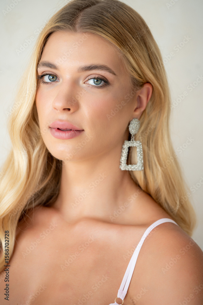 Fototapeta premium White lingerie photo set of beautiful blonde woman in clean studio light, showing front and side views. Perfect for underwear catalog, fashion e-commerce, and online advertising.