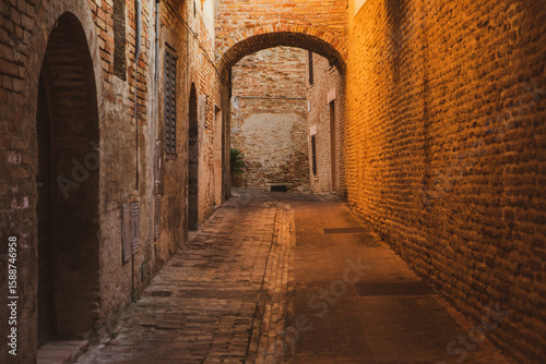 Fototapeta Naklejka Na Ścianę i Meble -  The traditional narrow medieval streets in Corinaldo, considered one of the most beautiful in Italy