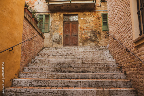 Fototapeta Naklejka Na Ścianę i Meble -  The traditional narrow medieval streets in Corinaldo, considered one of the most beautiful in Italy