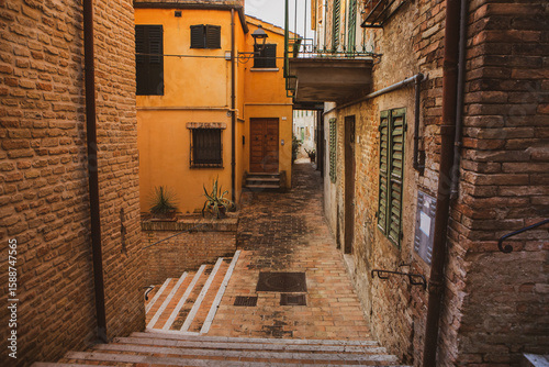 Fototapeta Naklejka Na Ścianę i Meble -  The traditional narrow medieval streets in Corinaldo, considered one of the most beautiful in Italy