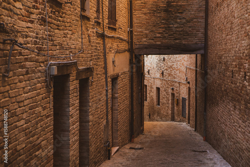 Fototapeta Naklejka Na Ścianę i Meble -  The traditional narrow medieval streets in Corinaldo, considered one of the most beautiful in Italy