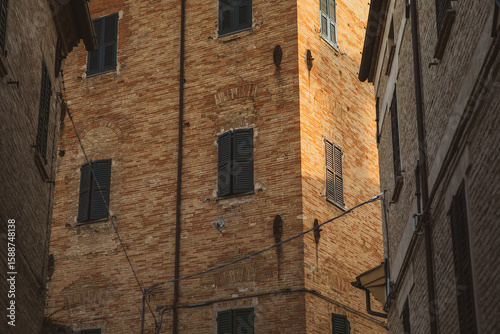 Fototapeta Naklejka Na Ścianę i Meble -  The traditional narrow medieval streets in Corinaldo, considered one of the most beautiful in Italy