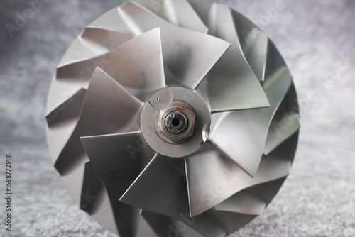 Close up Turbocharger rotor Shaft, impeller Shaft wheel turbocharger, turbine Shaft turbocharger on isolated background.
