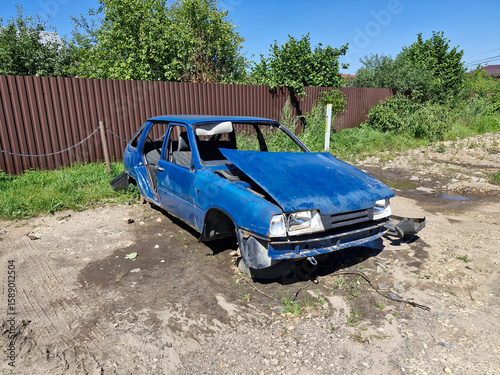 Old broken rusty passenger car