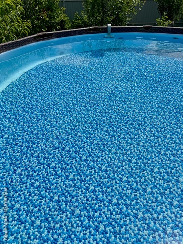 Clear blue water in a circular frame pool. High quality 4k footage