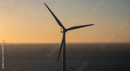 Wallpaper Mural Wind turbine generating clean energy at sunset over sea Torontodigital.ca