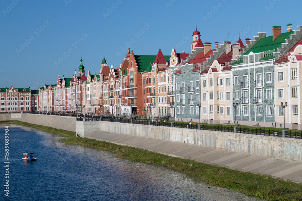 Fototapeta premium View of the city embankment on a sunny August day. Yoshkar-Ola