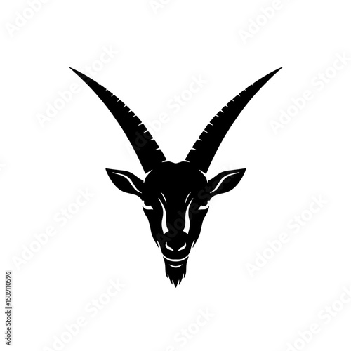 A stark black and white silhouette of a goat's head facing forward.