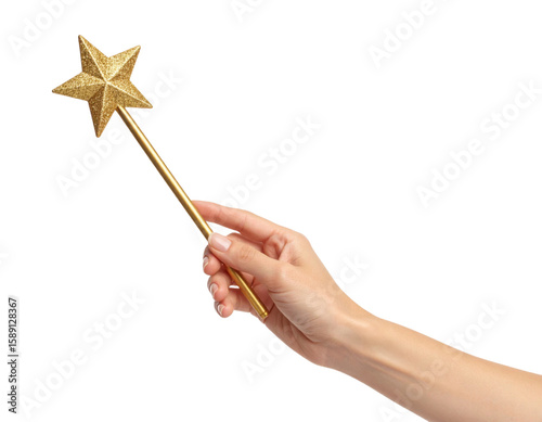 A hand holds a gold star-shaped magic wand with a glittery texture and a slender handle.
