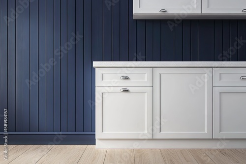 White kitchen cabinetry against a navy blue wall.
