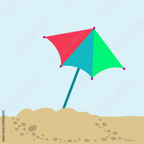 Colorful Beach umbrella in sand.