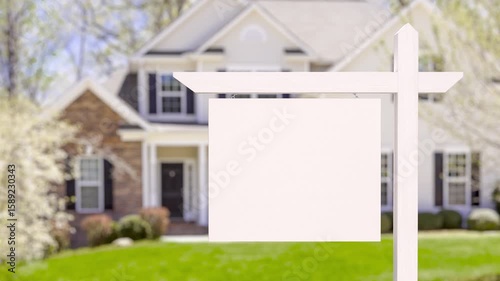 Blank Real Estate Sign in Front of New House.