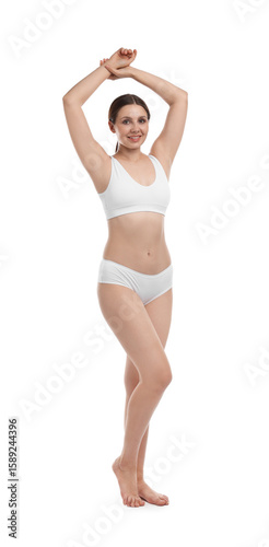 Beautiful woman in underwear on white background