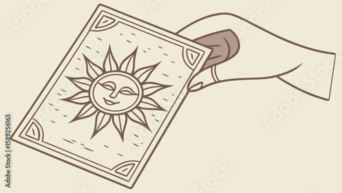Hand holding a tarot card with a sun design and decorative border in a minimalist illustration