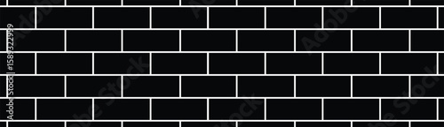 Minimalist overhead view of black rectangular tiles with white grout lines in a seamless horizontal pattern. Monochrome, geometric, and architectural style with flat, even lighting.