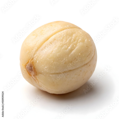 A single whole dried lotus seed, nutritious and mildly sweet, used in cooking,
