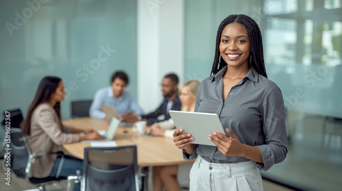 Smile, boardroom and portrait of a black woman with a tablet for training, meeting or teamwork. Happy, business and a corporate employee. professional Black woman with braided hair